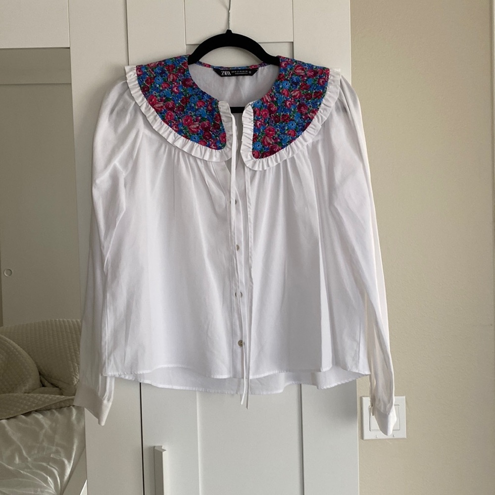 White floral blouse